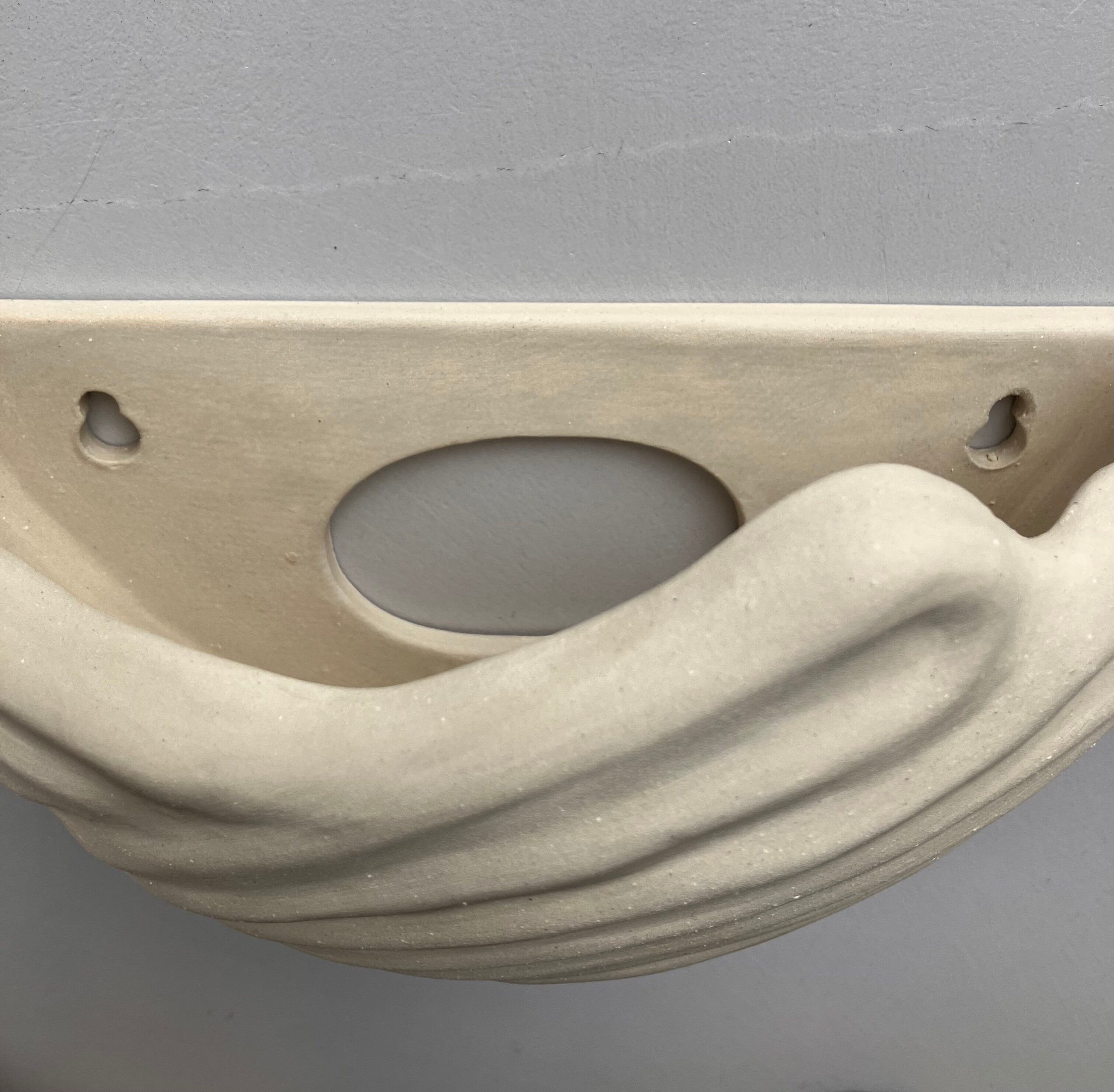 Applique murale forme coquillage en céramique artisanale