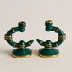 Pair of green and gold ceramic candlesticks