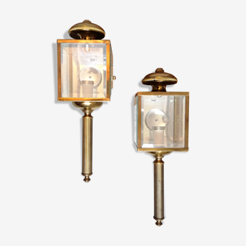 Brass and beveled glass lantern-like wall lamps in brass and beveled glass