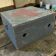 Vintage grey wooden chest with red cross 'first aid'