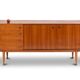 Teak sideboard, with four drawers and two doors. 20th century.