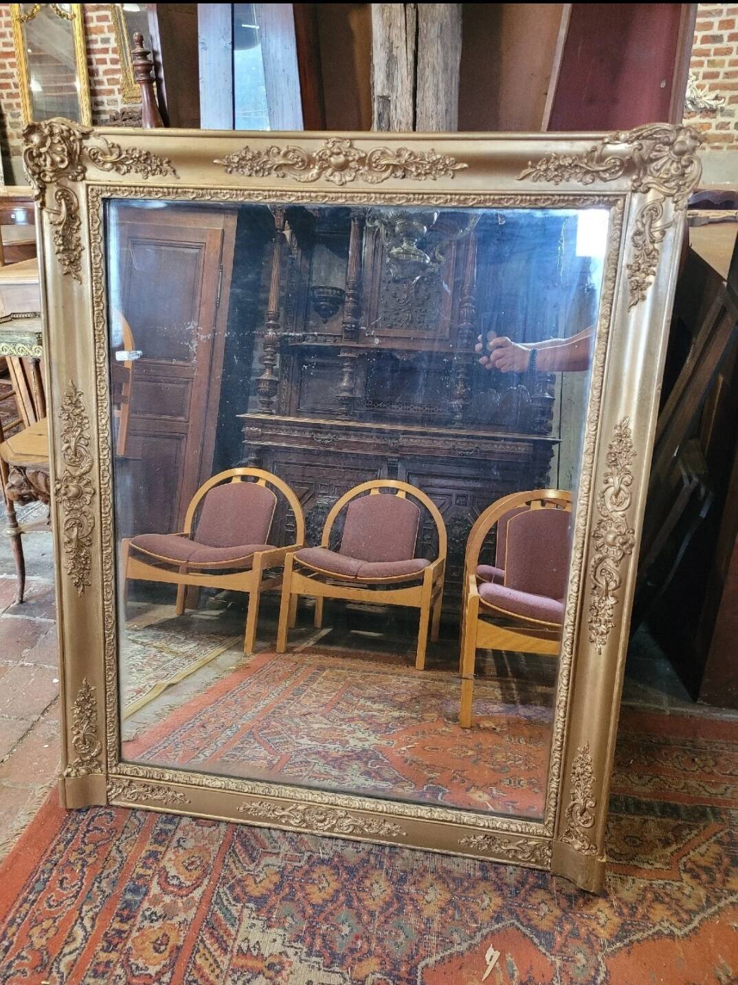 Antique gilded mirror from the 19th century, mercury mirror.