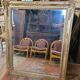 Antique gilded mirror from the 19th century, mercury mirror.