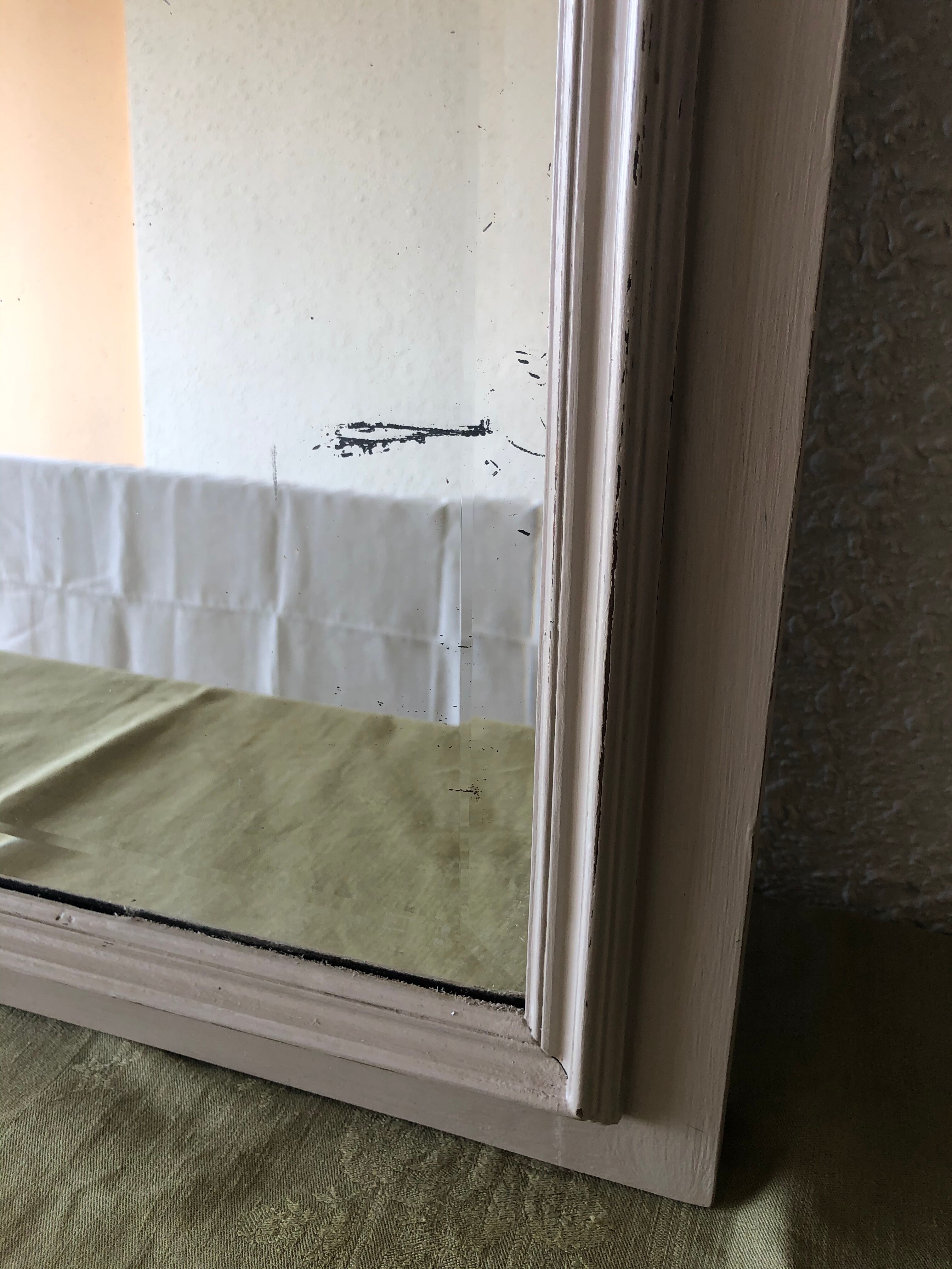 Large patinated wooden mirror with bevelled ice 73x113cm