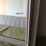 Large patinated wooden mirror with bevelled ice 73x113cm