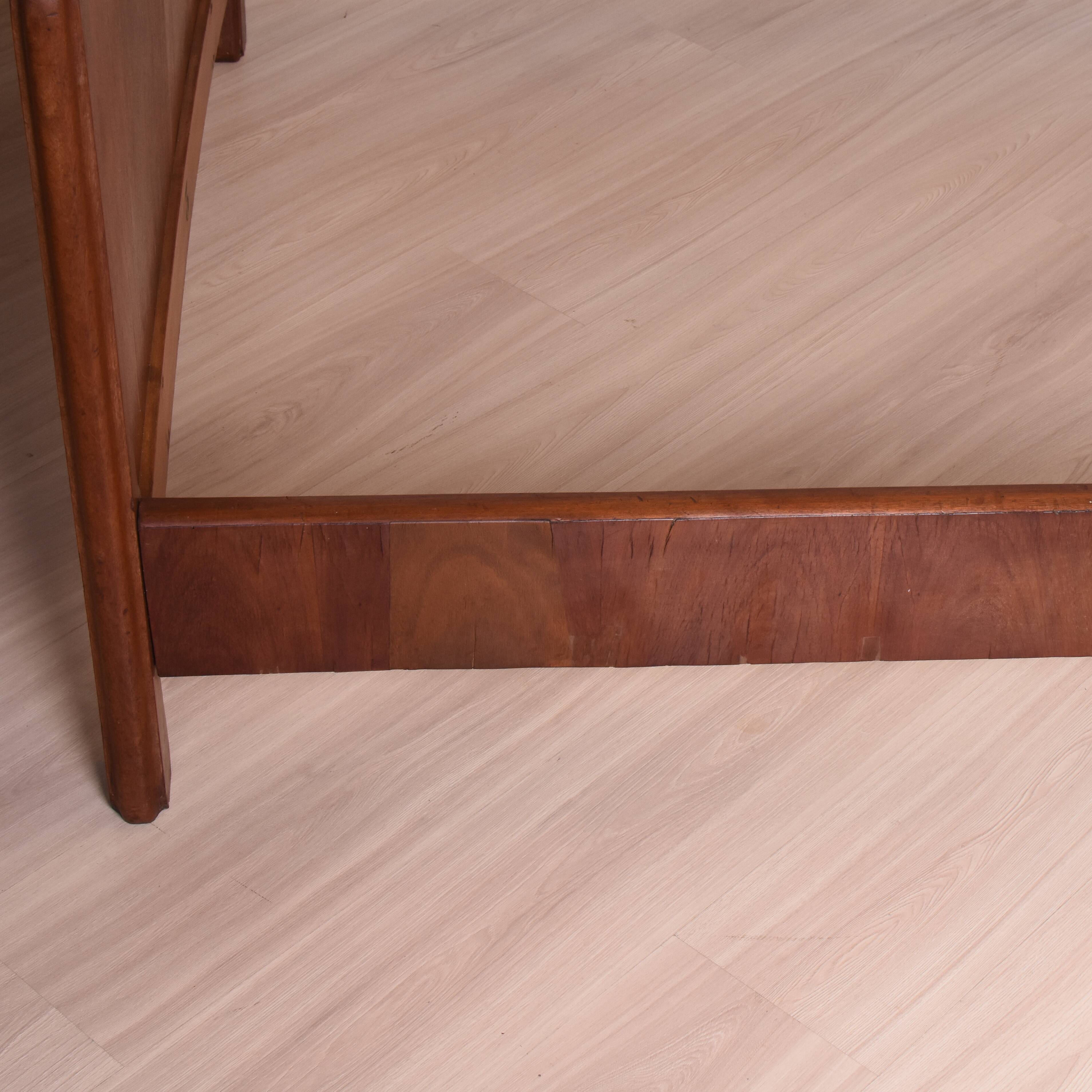 Wooden bed, early 20th century.