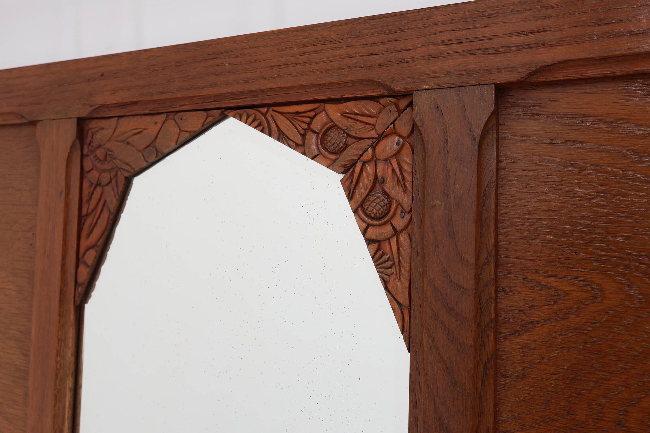 Art Deco oak carved wall coatrack with mirror, France 1920s