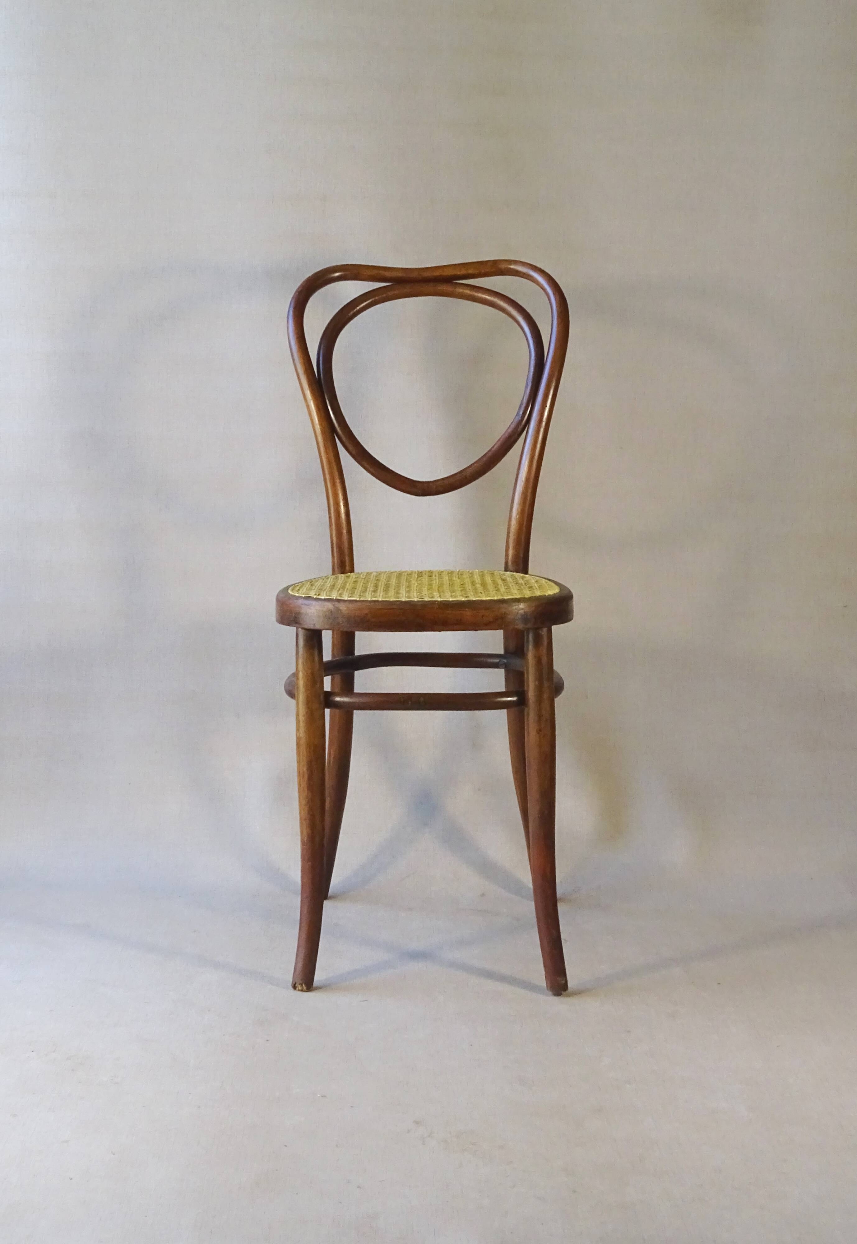 Fake pair of caned bistro chairs, Kohn and Mundus, circa 1910 - no Thonet.