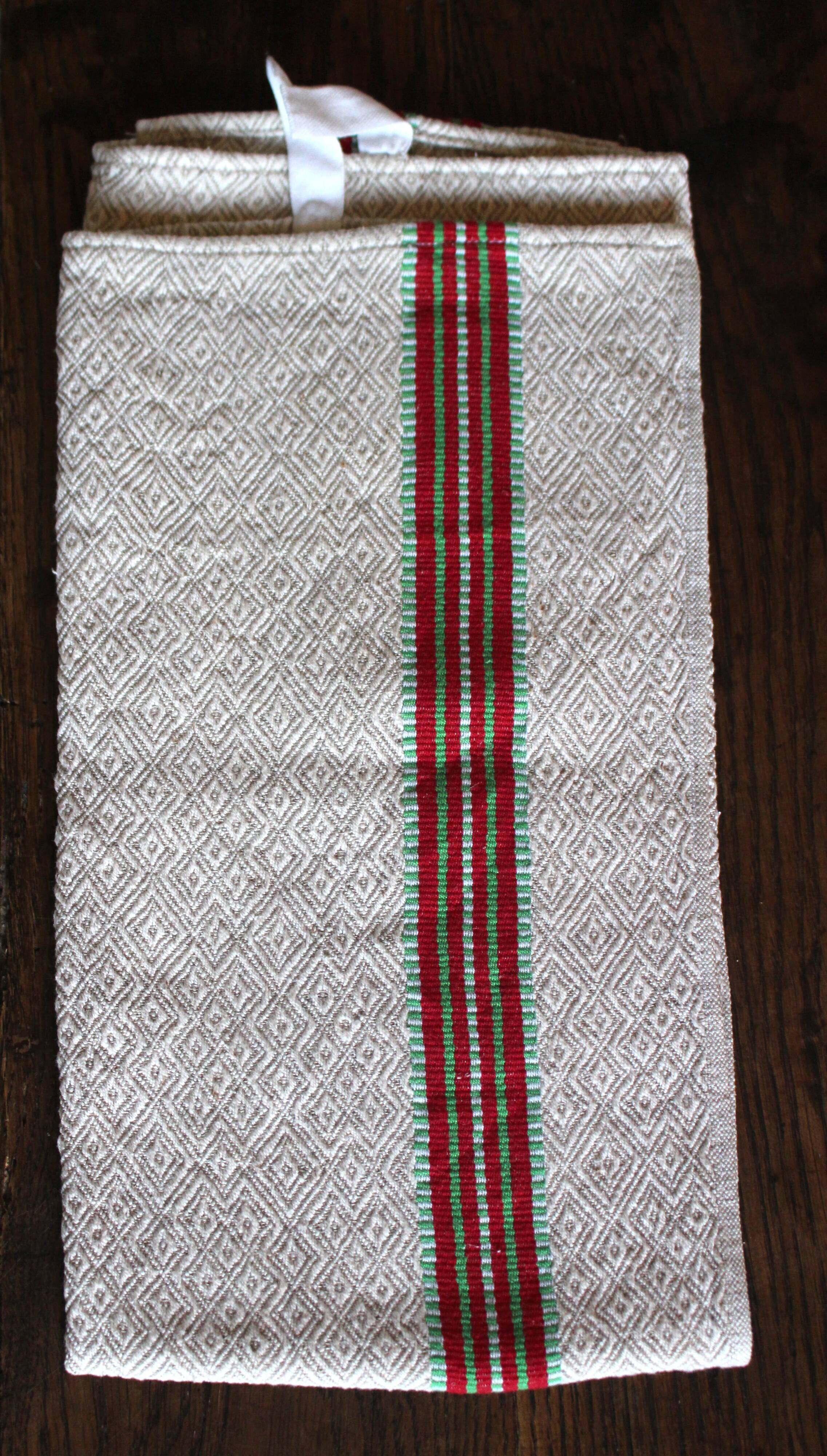 Old chevron towel with red and green stripes.