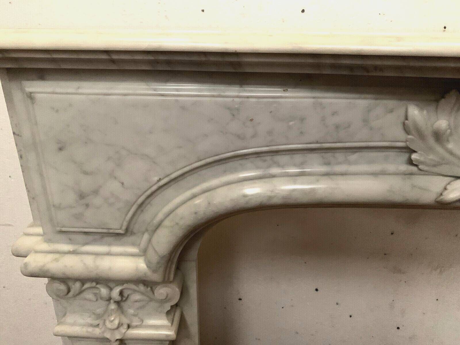 Regency style fireplace in white Carrara marble, Italy, 19th century.