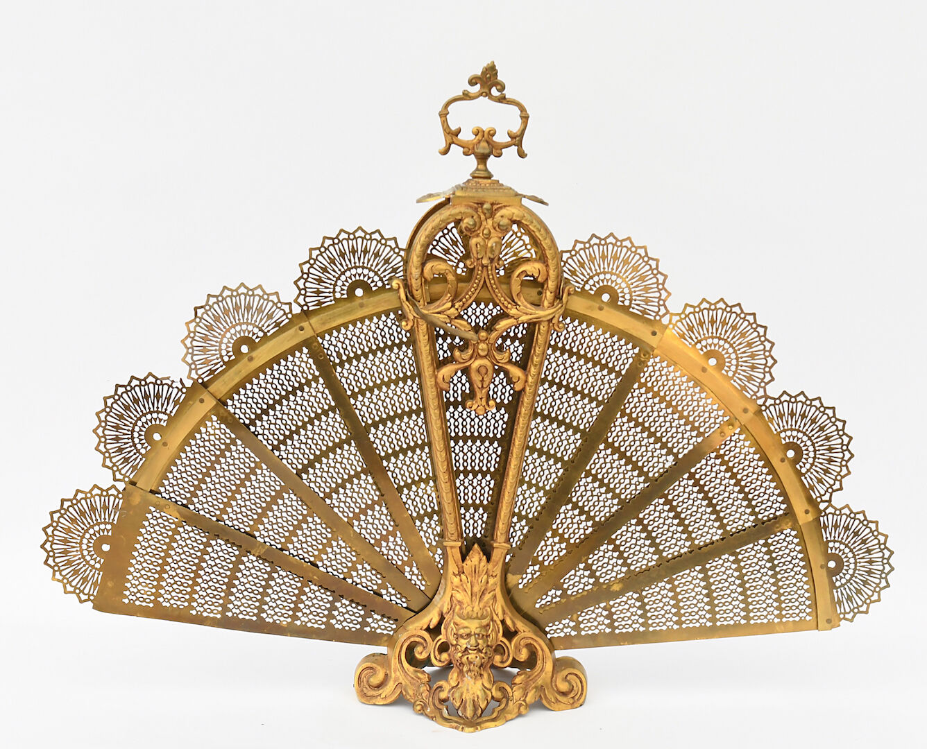 Bronze spark arrestor with fan-shaped openwork brass plates