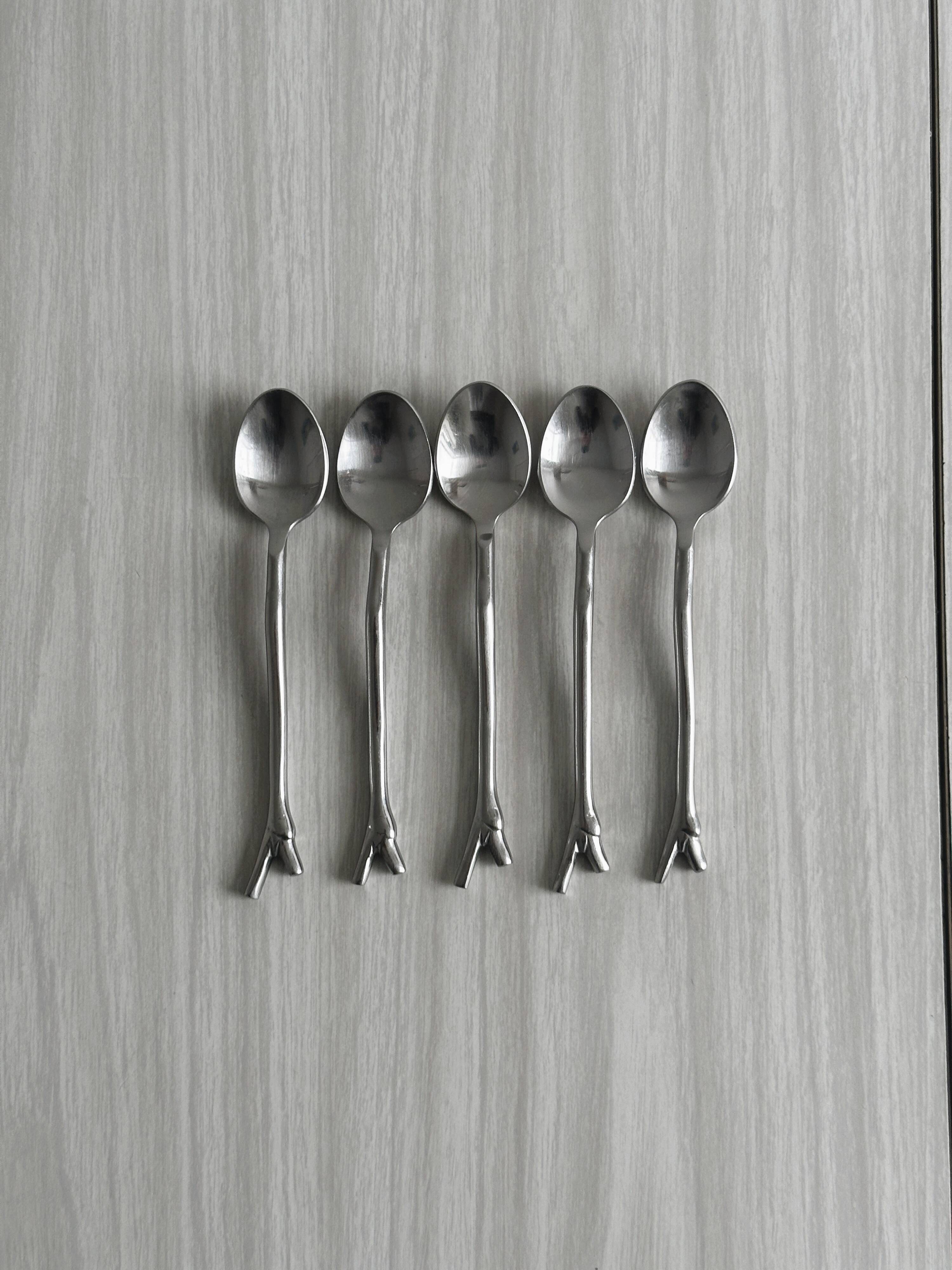 5 small silver metal spoons