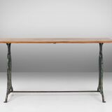 French bistro table with elegant metal base and oak top, ca. 1890