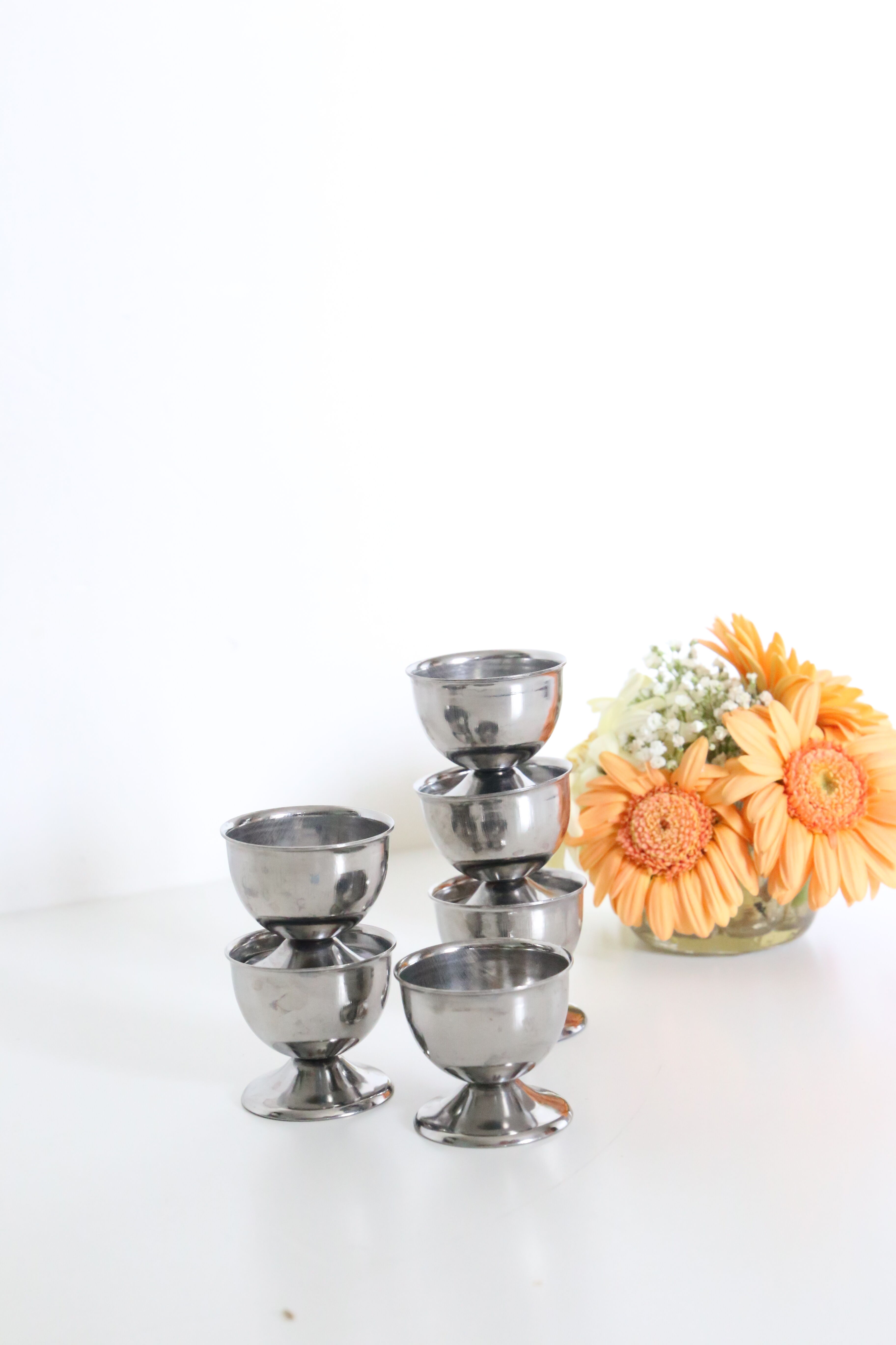 Set of six stainless steel coquetiers, vintage French