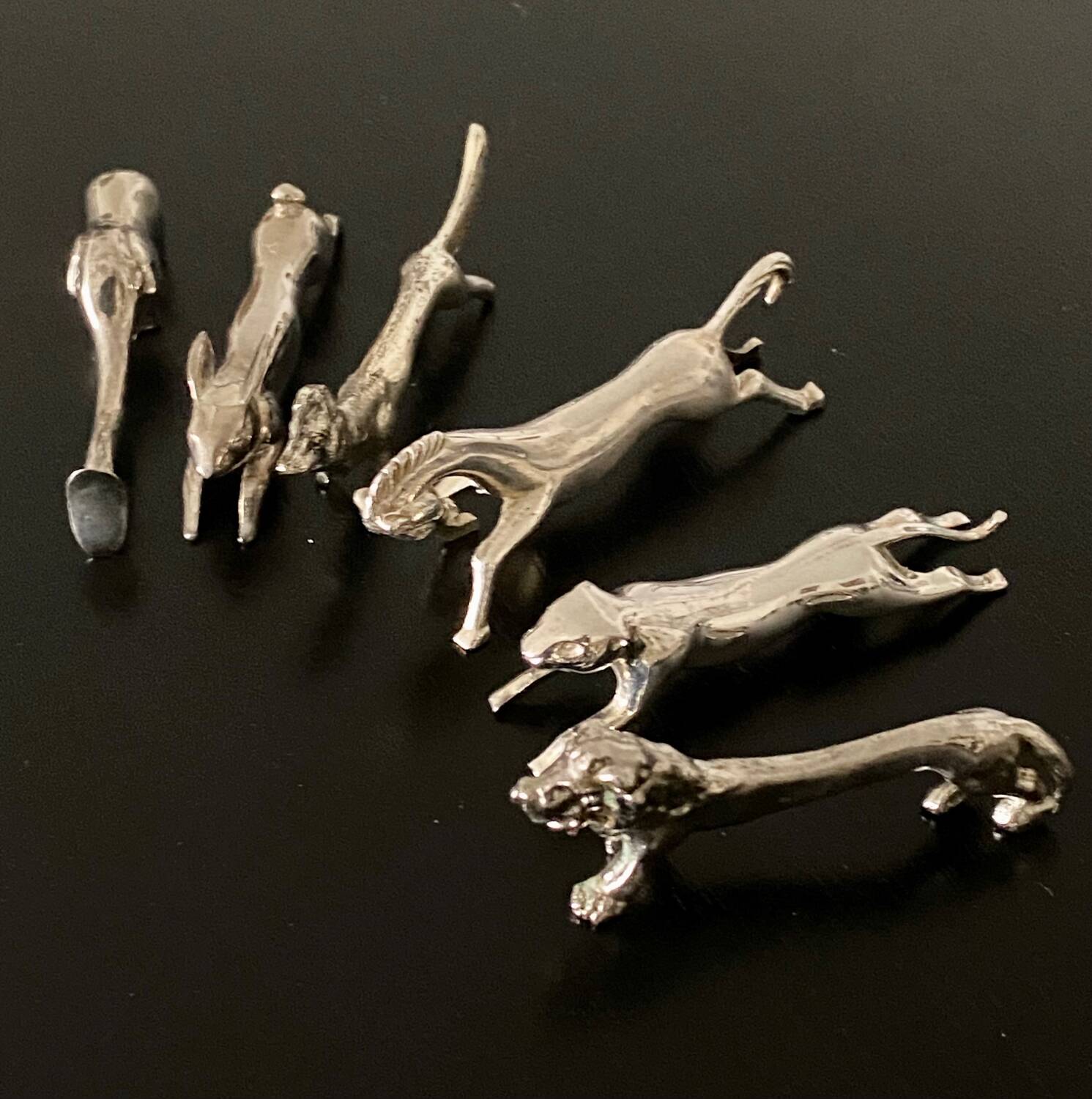 6 various animal shaped knife holders in silver metal