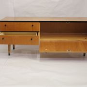 Black-gloved 50s varnished wooden sideboard
