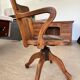 Fauteuil de bureau en bois et cuir