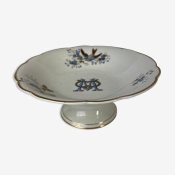 Standing dish with a monogram M and blue and brown bird