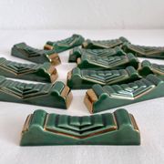 12 vintage green and gold ceramic knife holders from the 50s