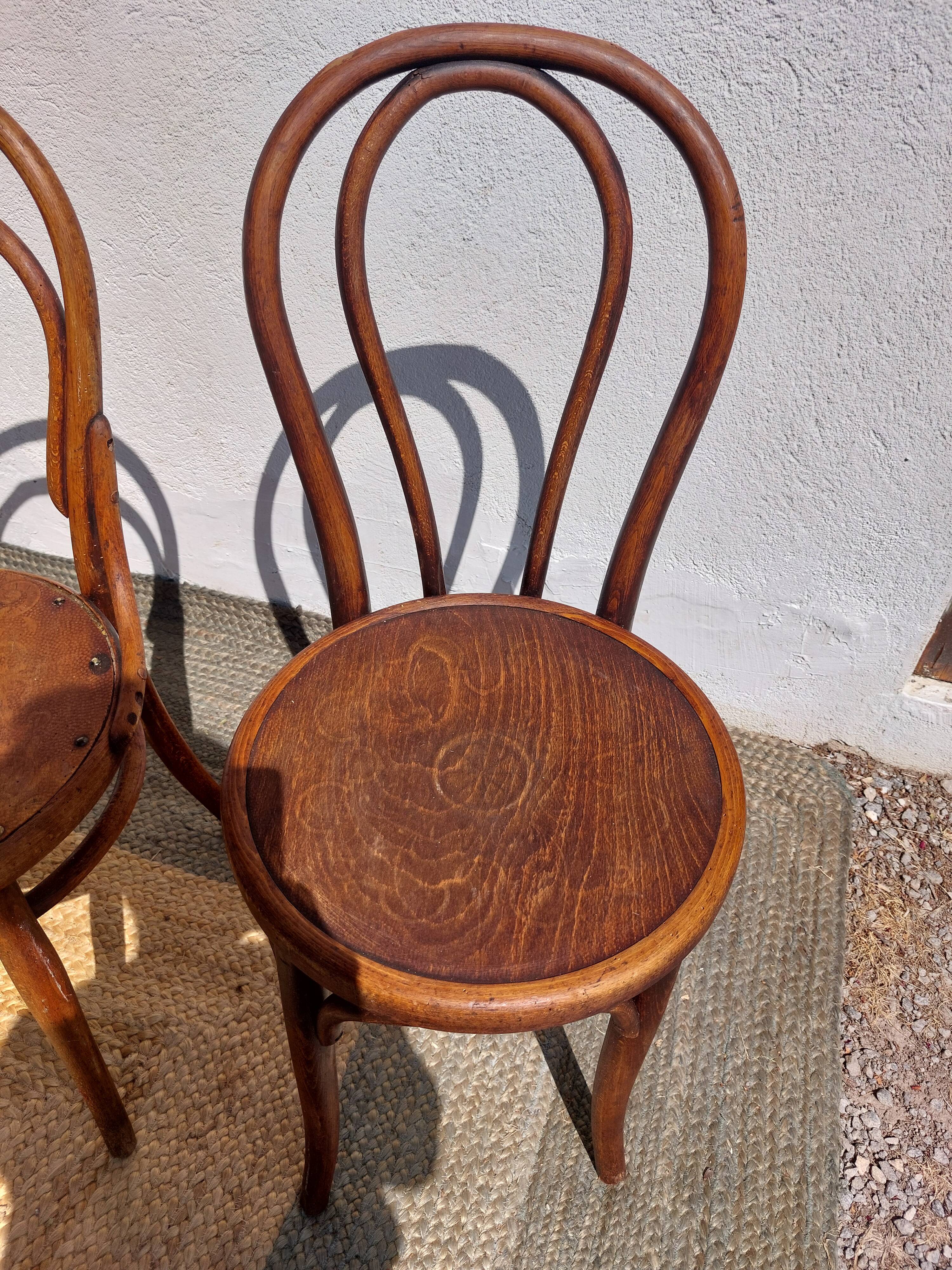 4 curved wooden bistro chairs