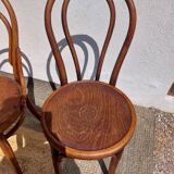 4 curved wooden bistro chairs