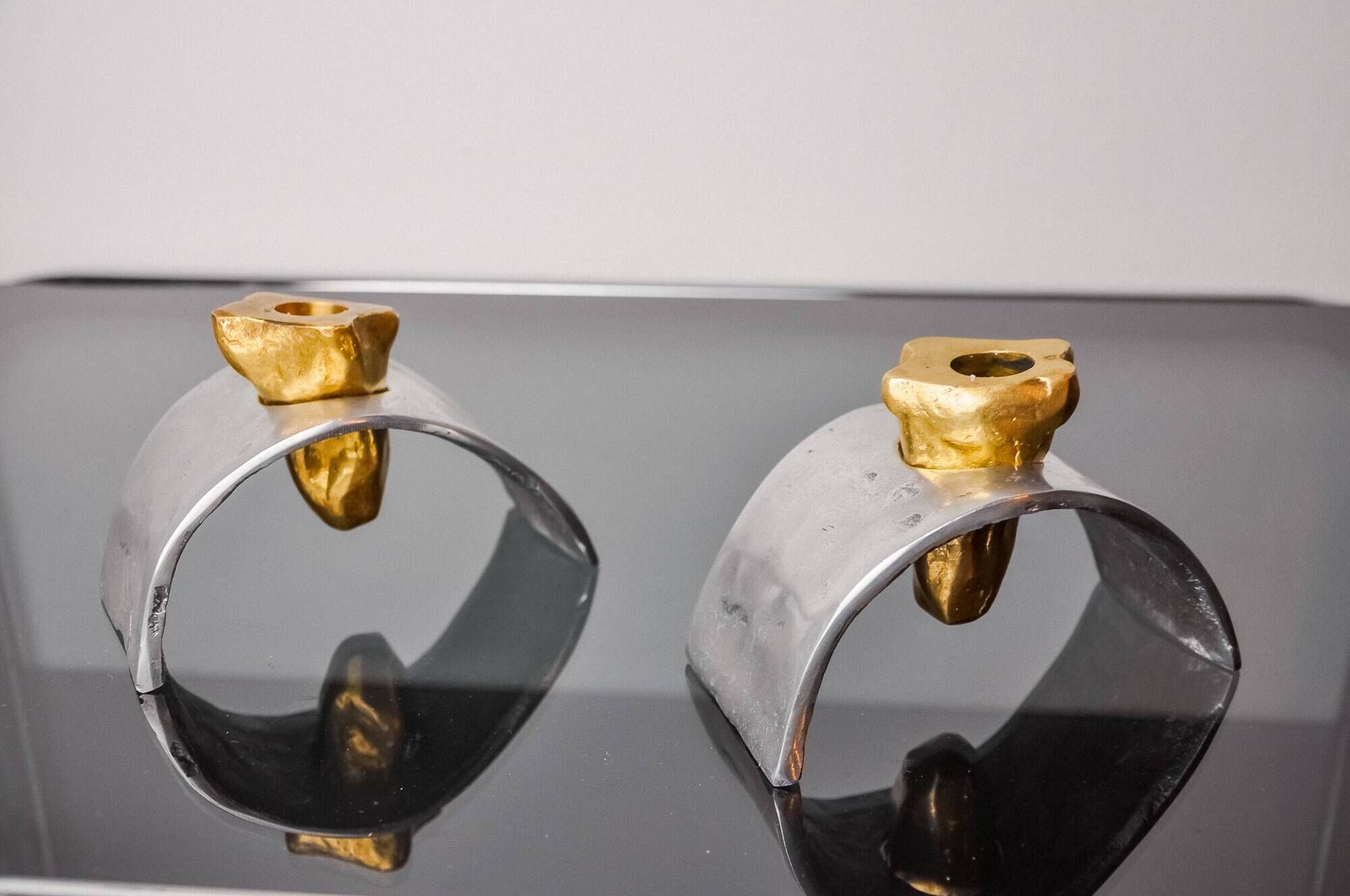 Pair of Brutalist candlesticks by David Marshall, bronze and aluminum, Spain, 1970
