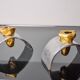 Pair of Brutalist candlesticks by David Marshall, bronze and aluminum, Spain, 1970