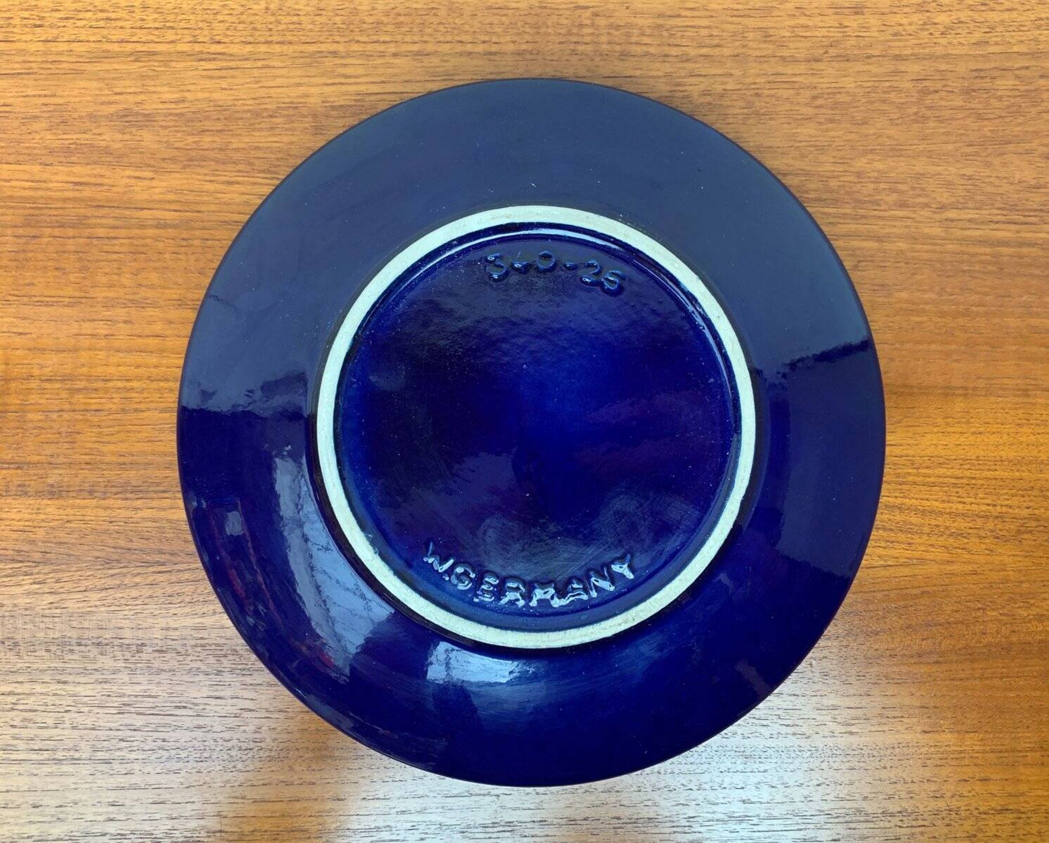 Dark blue pottery bowl from West Germany from the mid-century, 1960s.