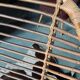 Rattan armchair and black metal base 1960