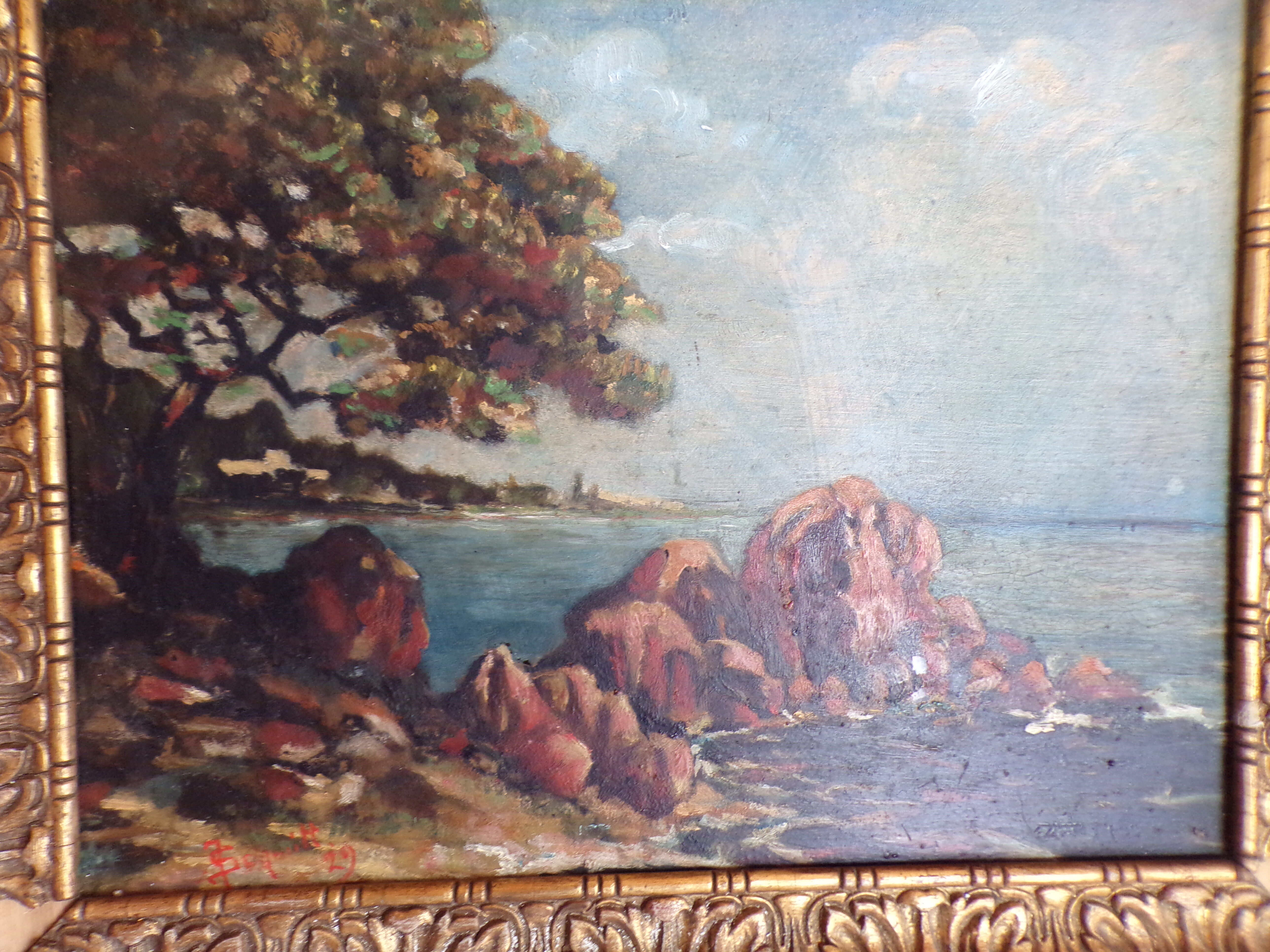 Signed seaside landscape painting dated 1929