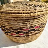 Antique basket with ethnic lid with black/brown and red décor
