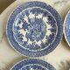 Set of four flat plates from English earthenware.