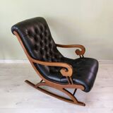 Black leather rocking Chesterfield armchair