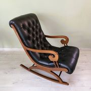 Black leather rocking Chesterfield armchair