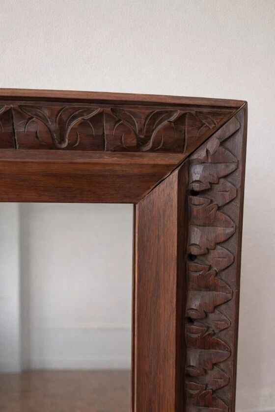 Antique carved wooden mirror