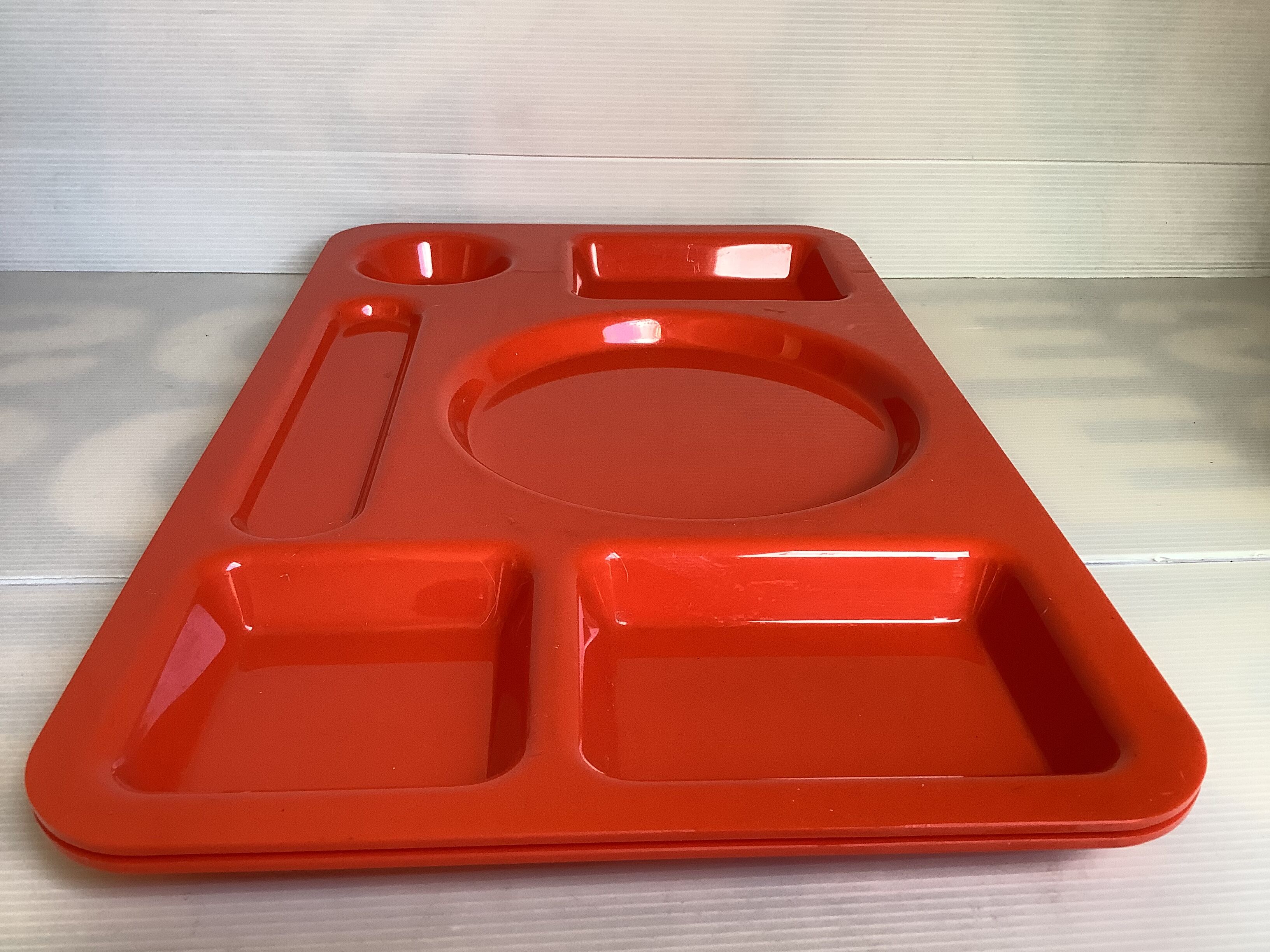 Pair of orange guzzini meal trays