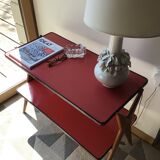 Double-footed red Formica wood spindles console