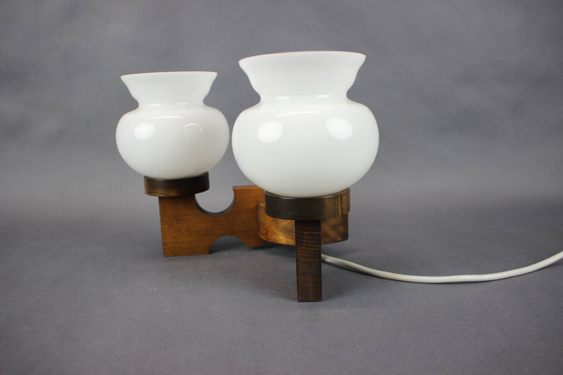 Czechoslovak wall lamp from the 1960s with Valasske Mezirici glass and a wooden base.