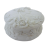 White porcelain biscuit candy bar decorated with a graceful feminine profile. Around 1900