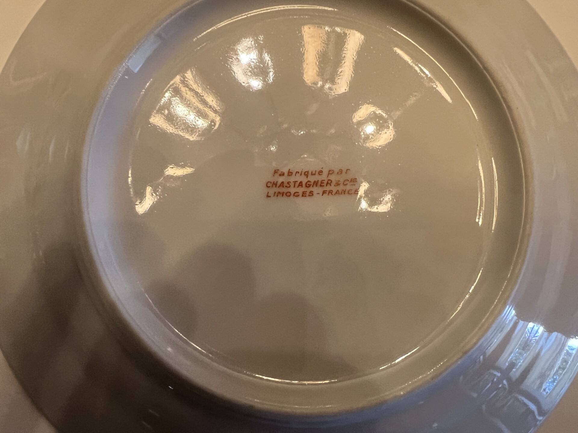Service of 34 Limoges porcelain plates by Chastagner & Cie – Gilded borders.