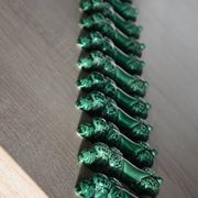 12 green earthenware knife rests