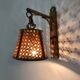 Pair of rattan and cane lantern wall lights. 1950s-1960s
