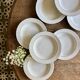Set of 8 vintage deep plates in German porcelain.