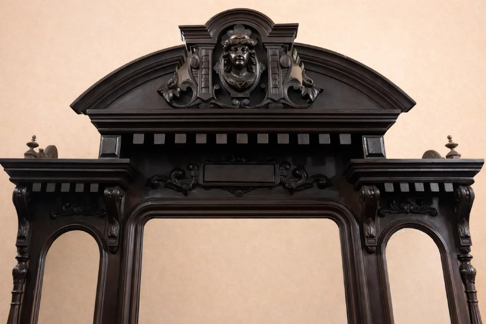Large antique blackened wood carved cheval mirror