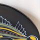 Black faience plate with stylised fish, Ty Breiz spirit from the 1960s.