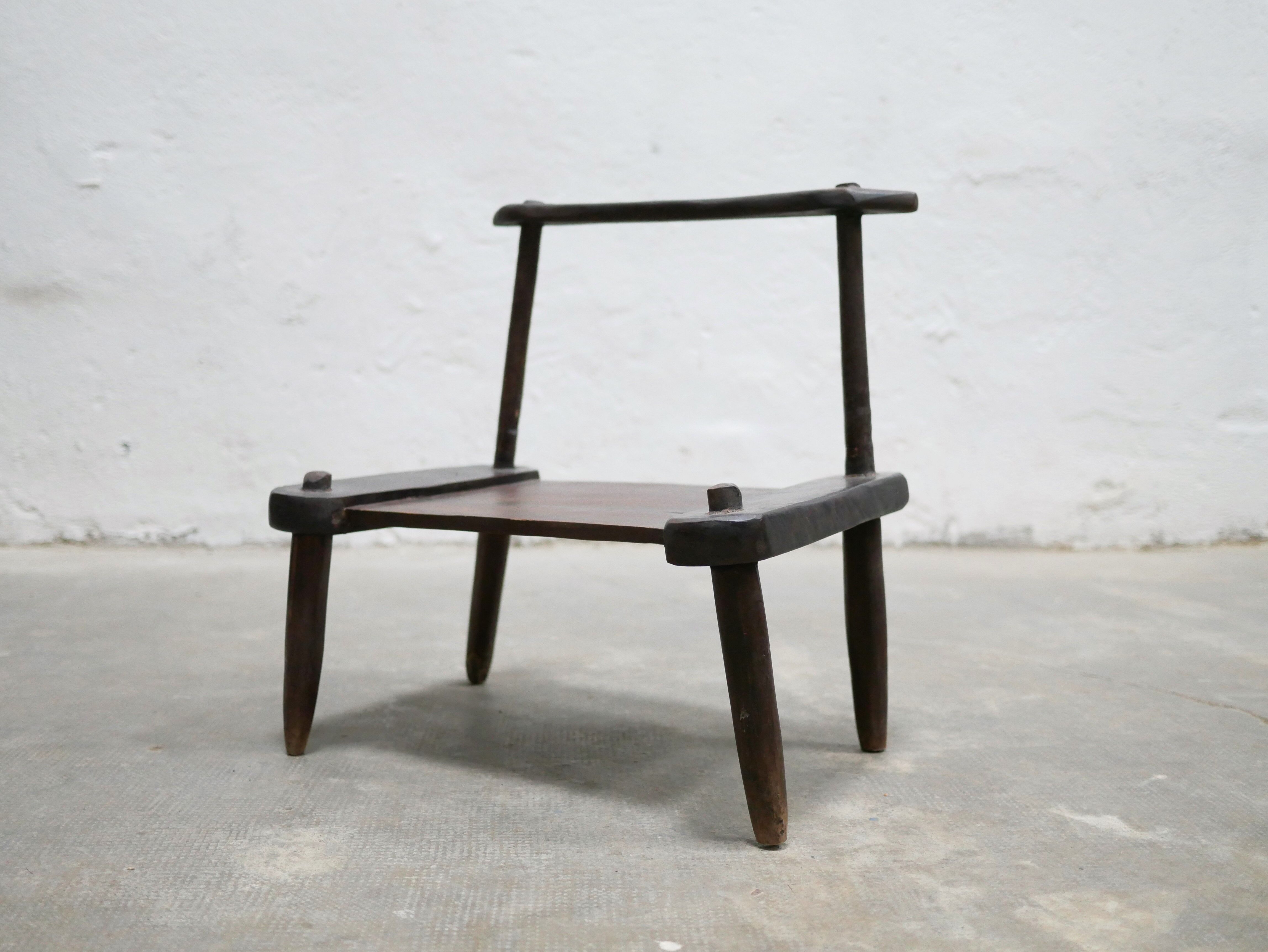 Ancient brutalist African chair