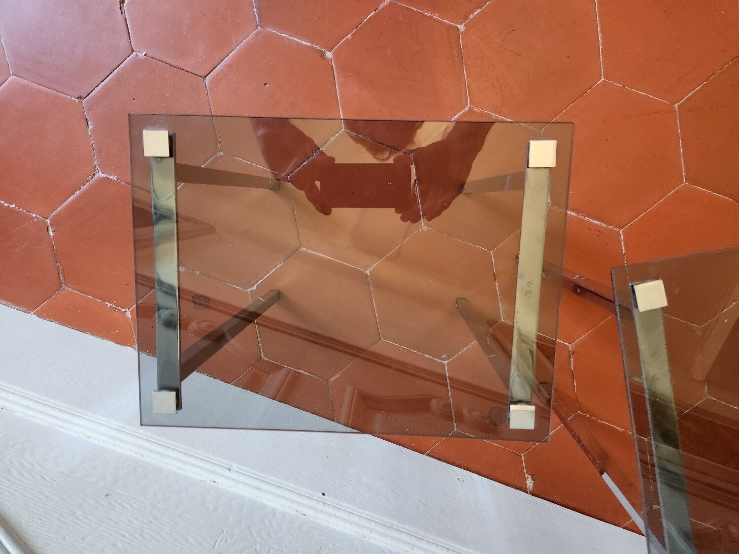3 nesting tables from the 1970s in smoked glass.