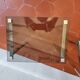 3 nesting tables from the 1970s in smoked glass.