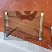 3 nesting tables from the 1970s in smoked glass.