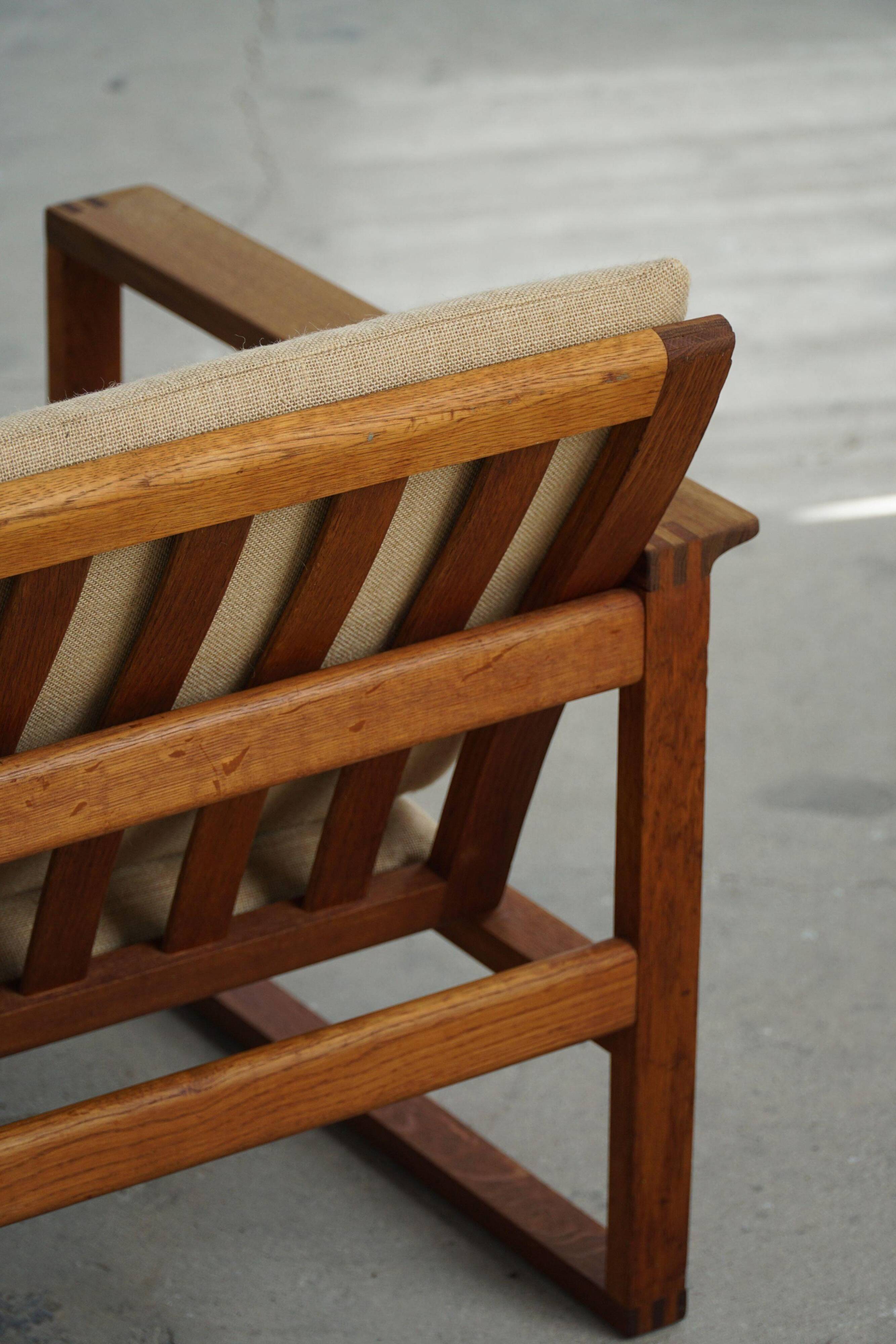 Børge Mogensen, a pair of BM2256 lounge chairs in oak and jute, Denmark, 1960s.